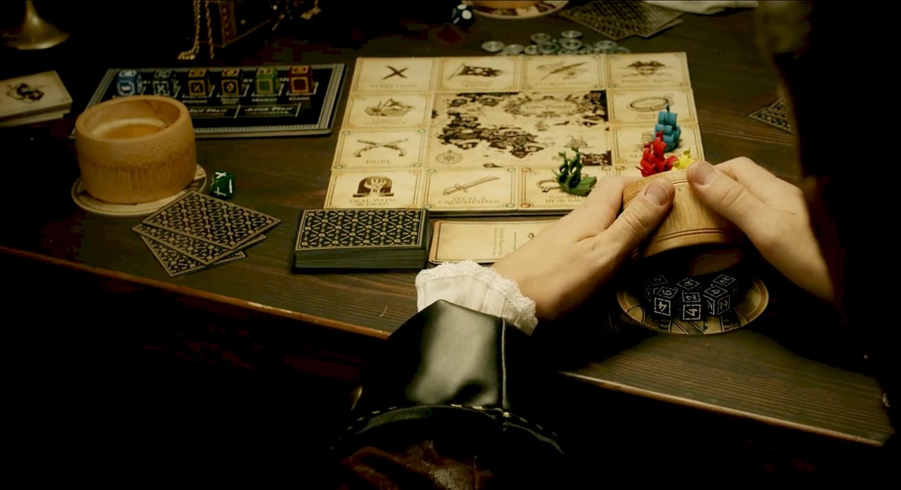 Family playing thematic board game together