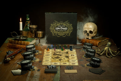 Lying Pirates Base Game box and components set up on a pirate table