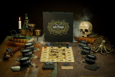 Lying Pirates Base Game box and components set up on a pirate table
