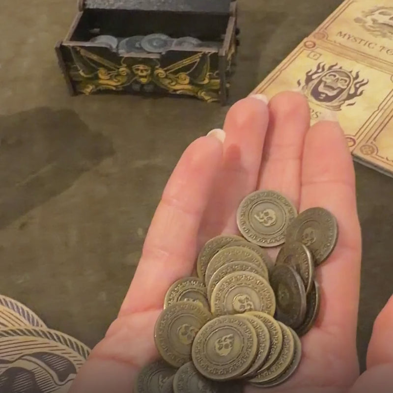 Gold Coins add-on: 20 metal coins worth 2 each, next to the silver coins from the Big Box