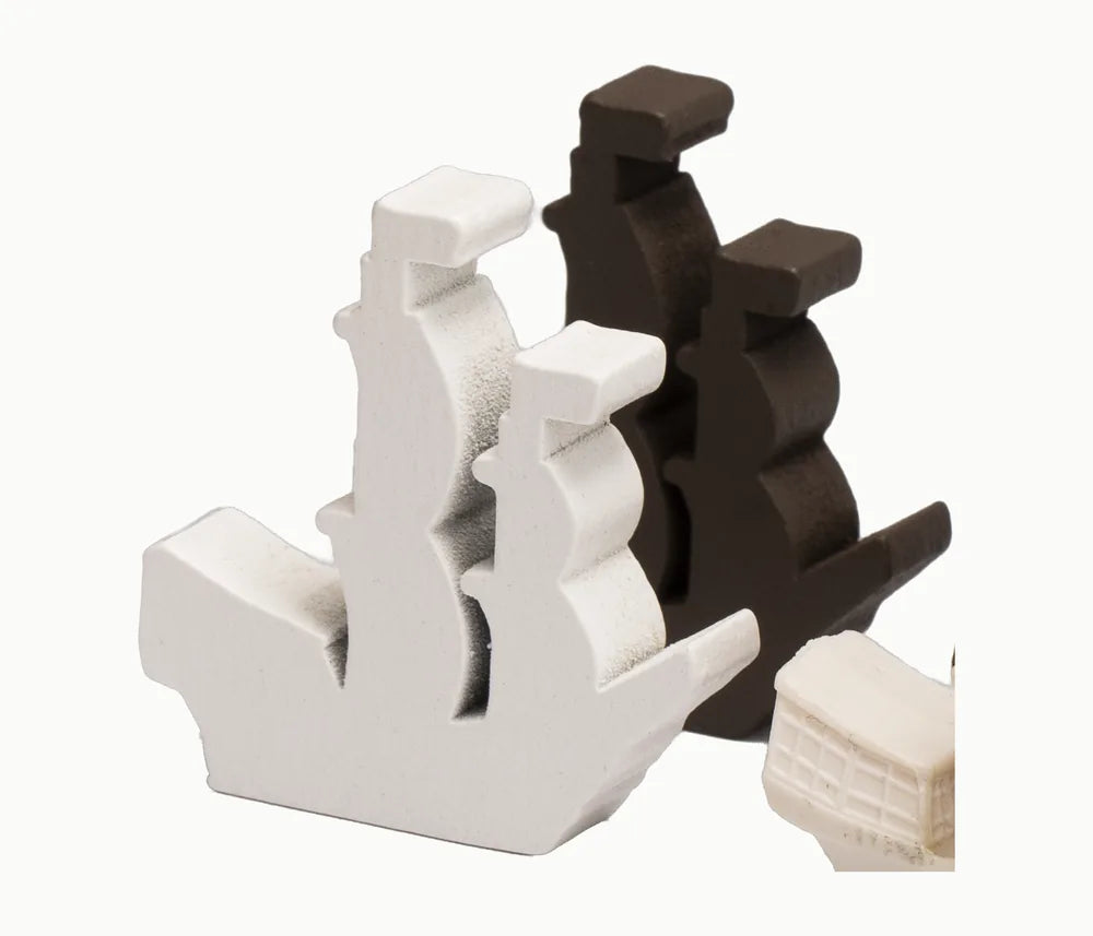 A white and a brown wooden ship
